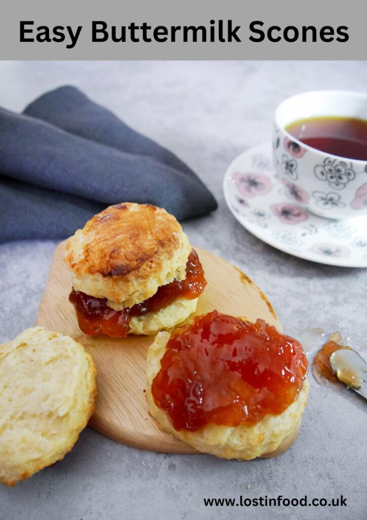 pinnable image with recipe title and two easy buttermilk scones spread with rhubarb and ginger jam and served with a cup of black tea alongside