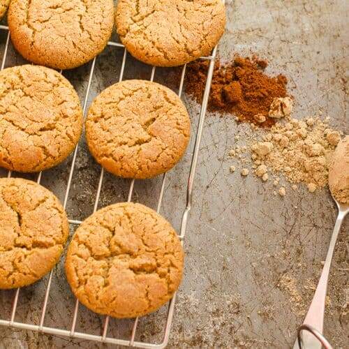 Ginger & Chilli Biscuits on a tray with a spoon and dried spices