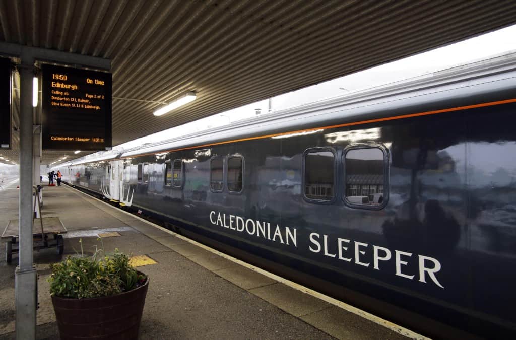 Fort William Station, Scotland. 31.3.15 Serco Managing Director Peter Strachan visited the new Caledonian Sleeper prior to it's inaugural service departing from Fort William. Also photographed is Station Charge-person Fiona Hynd-Morrison from Fort William giving the train a last polish up. More info from Dyan Owen Account manager Weber Shandwick, Inverness IV1 1LE dowen@webershandwick.com 01463 716 739 07738086818 Pictures Copyright: Iain McLean 79 Earlspark Avenue G43 2HE 07901 604 365 www.iainmclean.com photomclean@googlemail.com 07901 604 365 ALL RIGHTS RESERVED