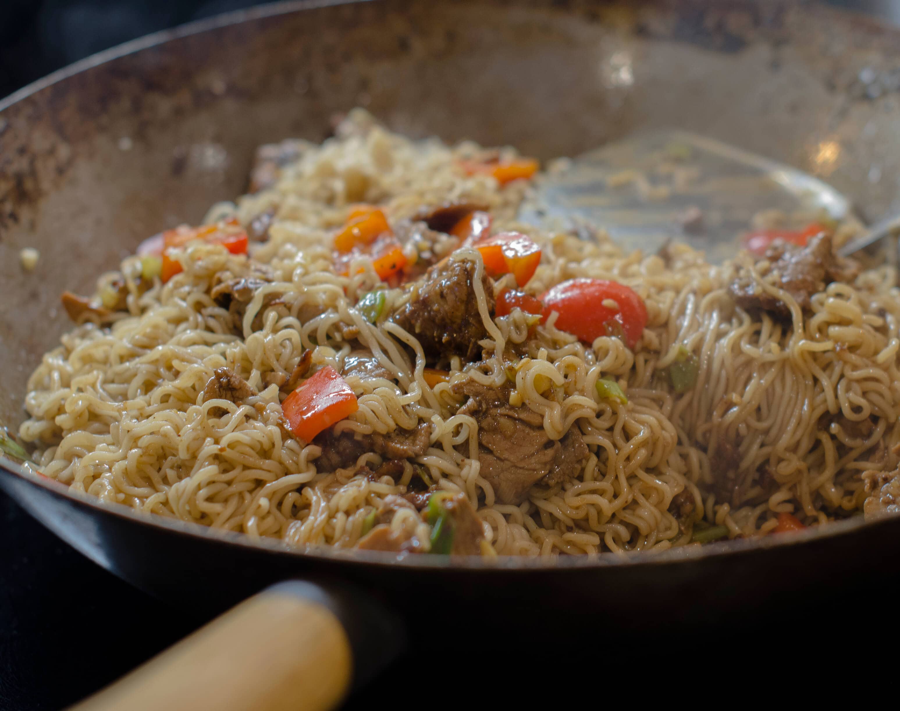 Pork & Peanut Stir-fry - tossing noodles