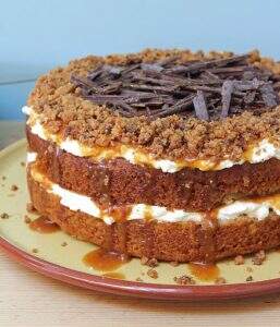 #CookBlogShare image of banoffee layer cake with a biscuit crumb and fresh cream filling