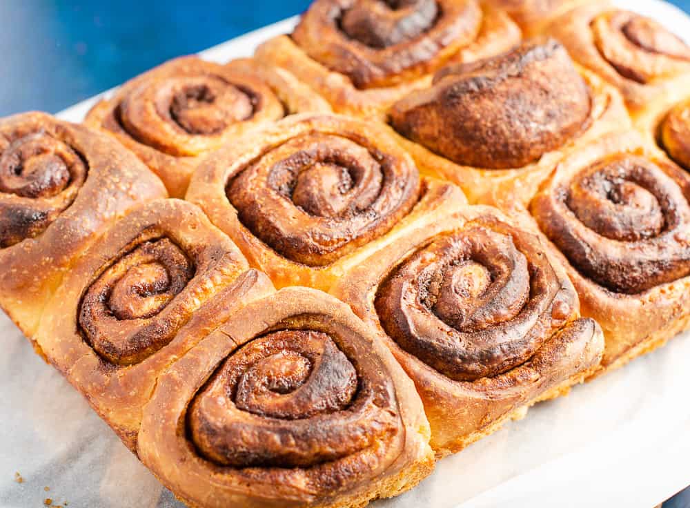 A warm tray of cinnamon buns fresh from the oven.