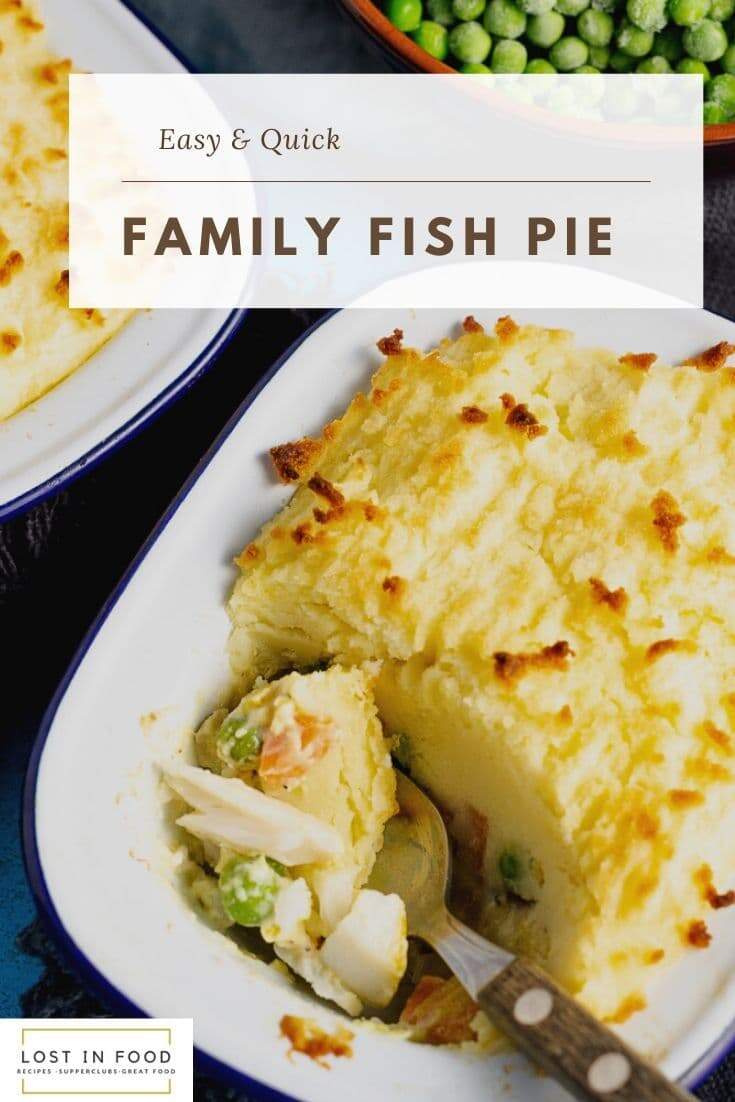 A family fish pie, topped with mashed potatoes, a bowl of peas in the background and a spoon digging into the pie to show how creamy and full it is. There is text on the image to show the title of the recipe.