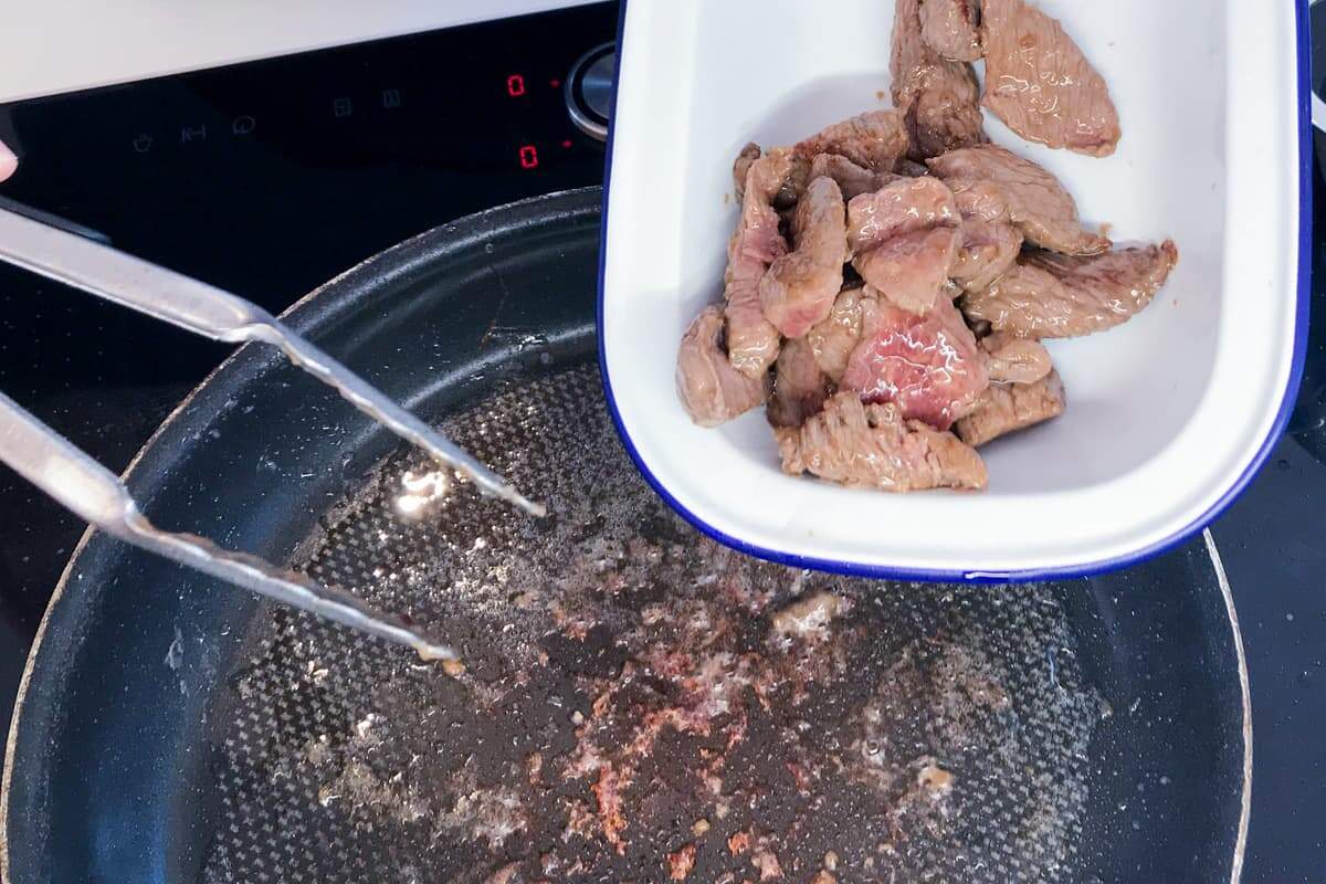 Remove the strips of been from the pan once seared.