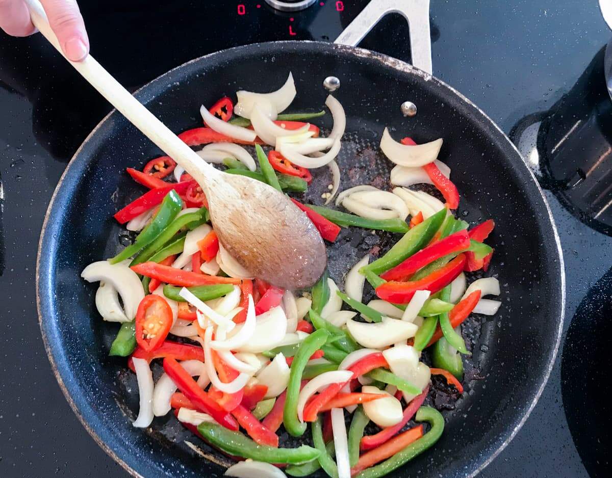 Stir fry the vegetables in the hot pan