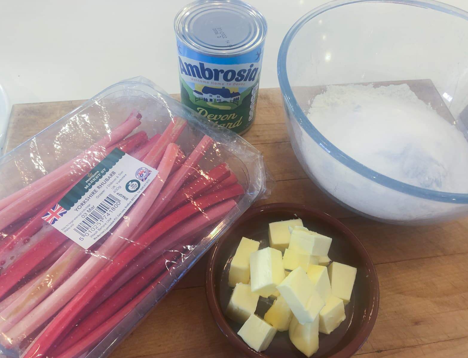 Step by step of making rhubarb crumble all ingredients measured and ready to begin.