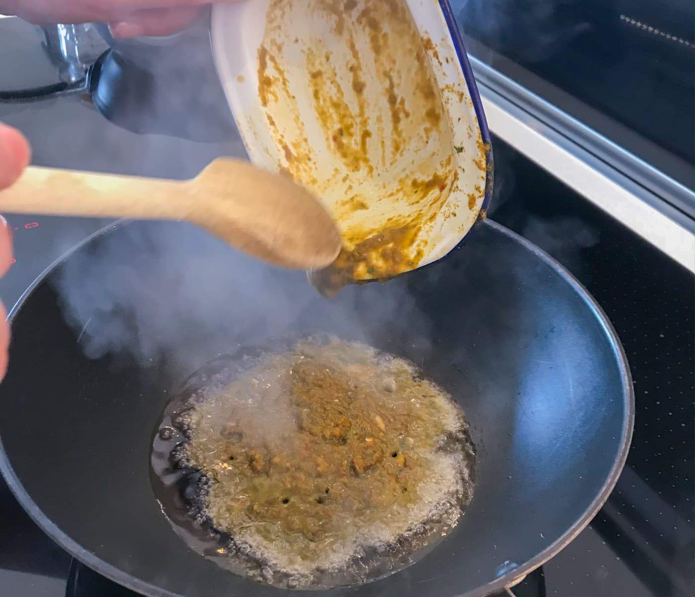 How to make vegetable & coconut curry but starting with cooking the paste down.