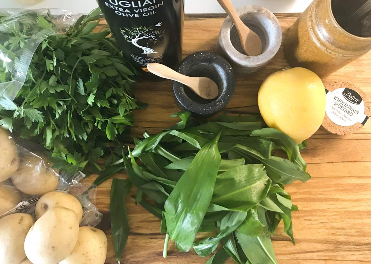 New potatoes, fresh wild garlic, lemon, wholegrain mustard, parsley and extra virgin olive oil to make a salad.