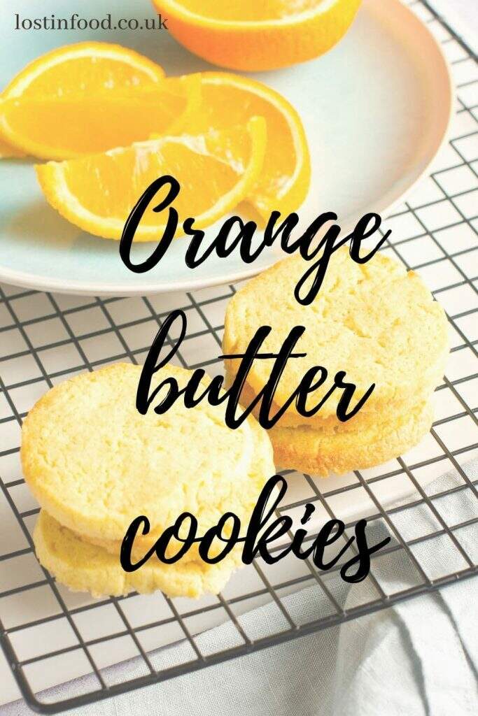 Orange butter cookies on a wire rack