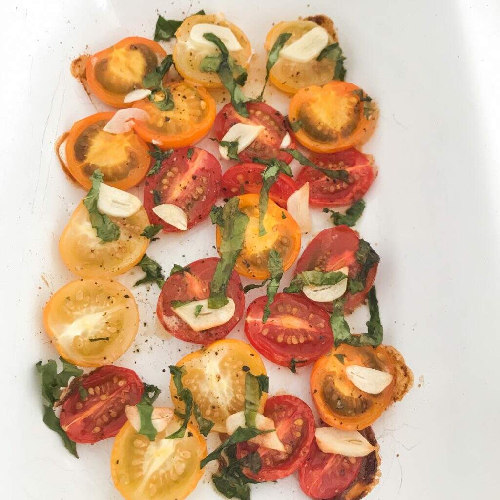 cherry tomatoes oven roasted with herbs and garlic.