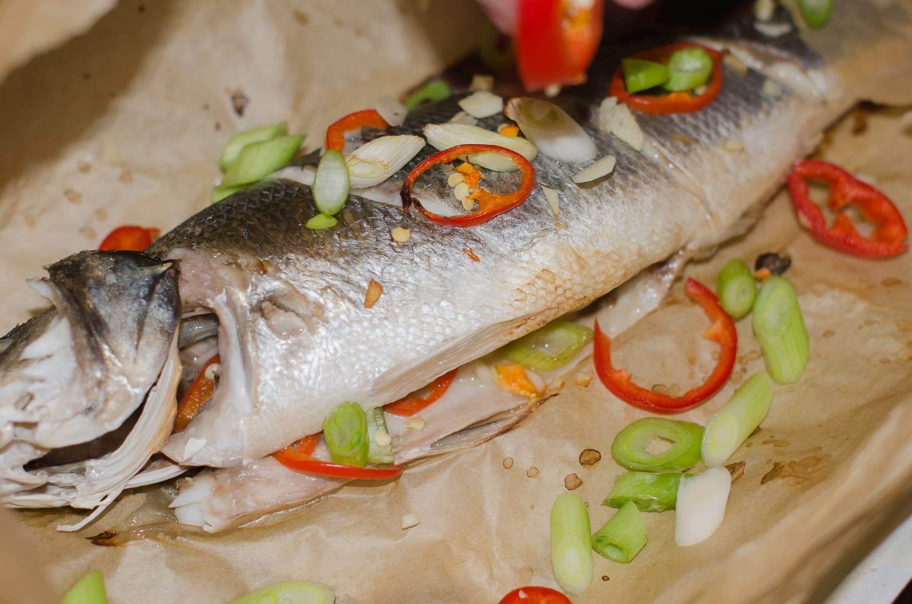 steamed asian style sea bass with green onions and chillies