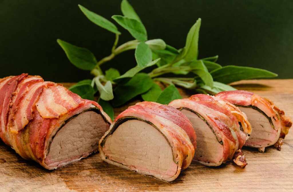 roast pork fillet wrapped in bacon with sage Lost in Food
