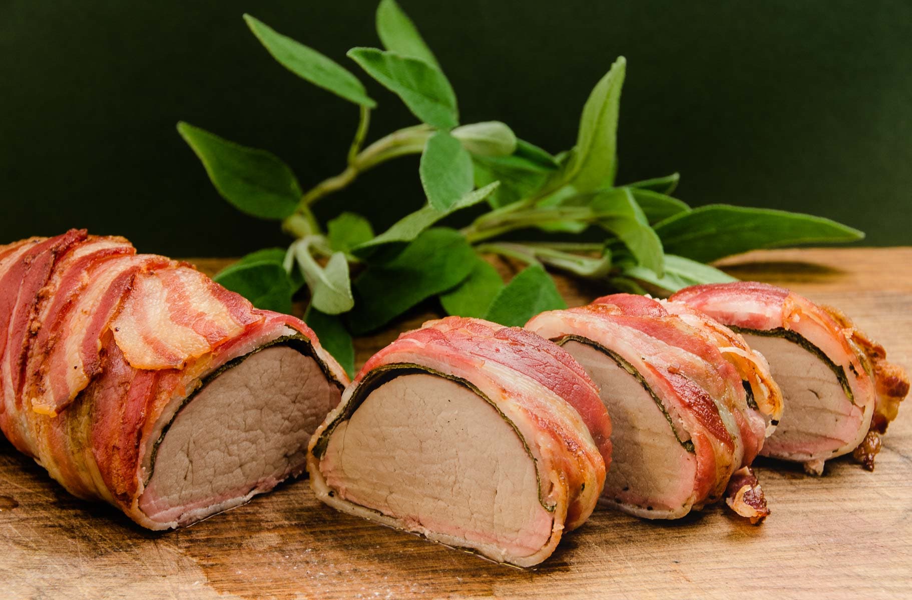 roast pork fillet wrapped in bacon with sage - Lost in Food