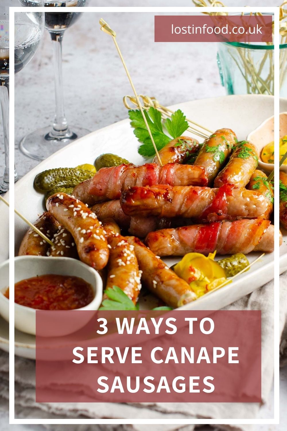 Pinterest graphic with cocktail sausages served along with glasses of wine.