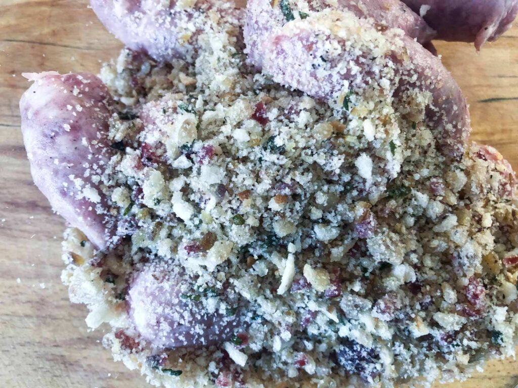 A cooled savoury stuffing mix added to sausages removed from their skins.