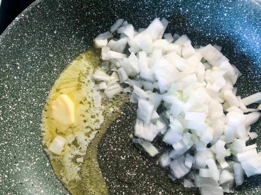 Onions diced and frying in oil and butter