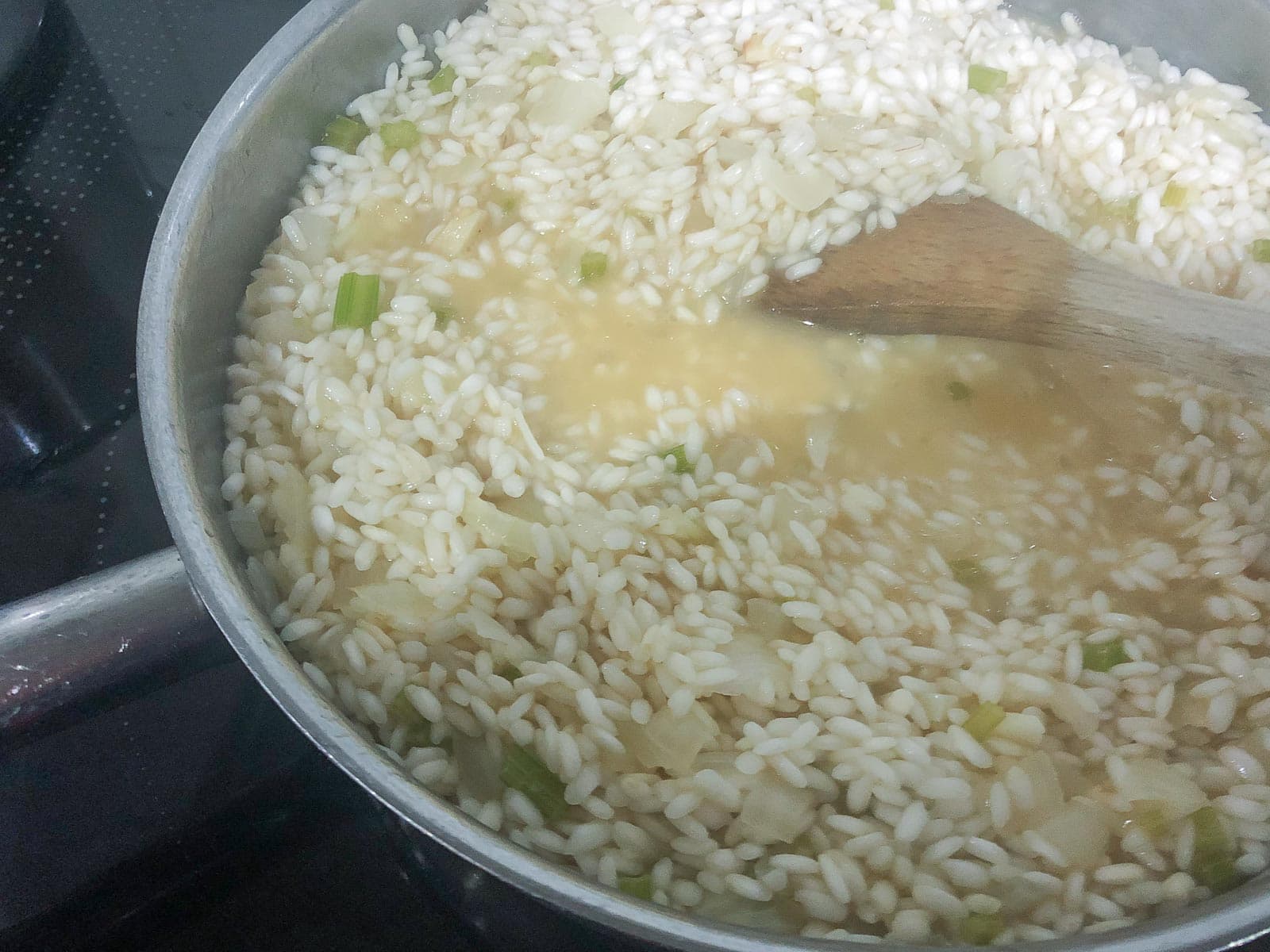 a pan of risotto cooking slowly