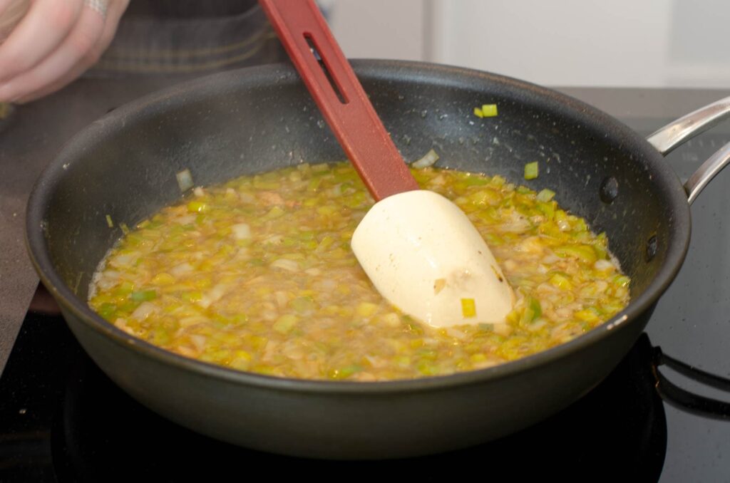 Sautéed leeks and garlic in a large frying pan and added white white to make a sauce reduction.