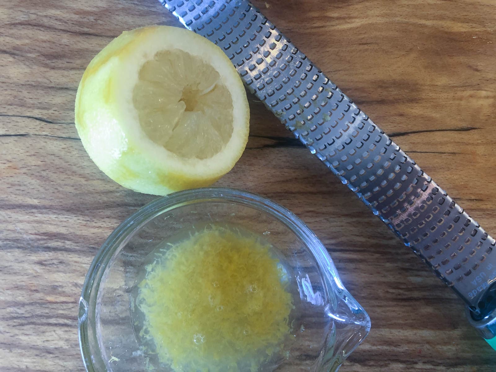 Freshly grated lemon zest and squeezed lemon juice.