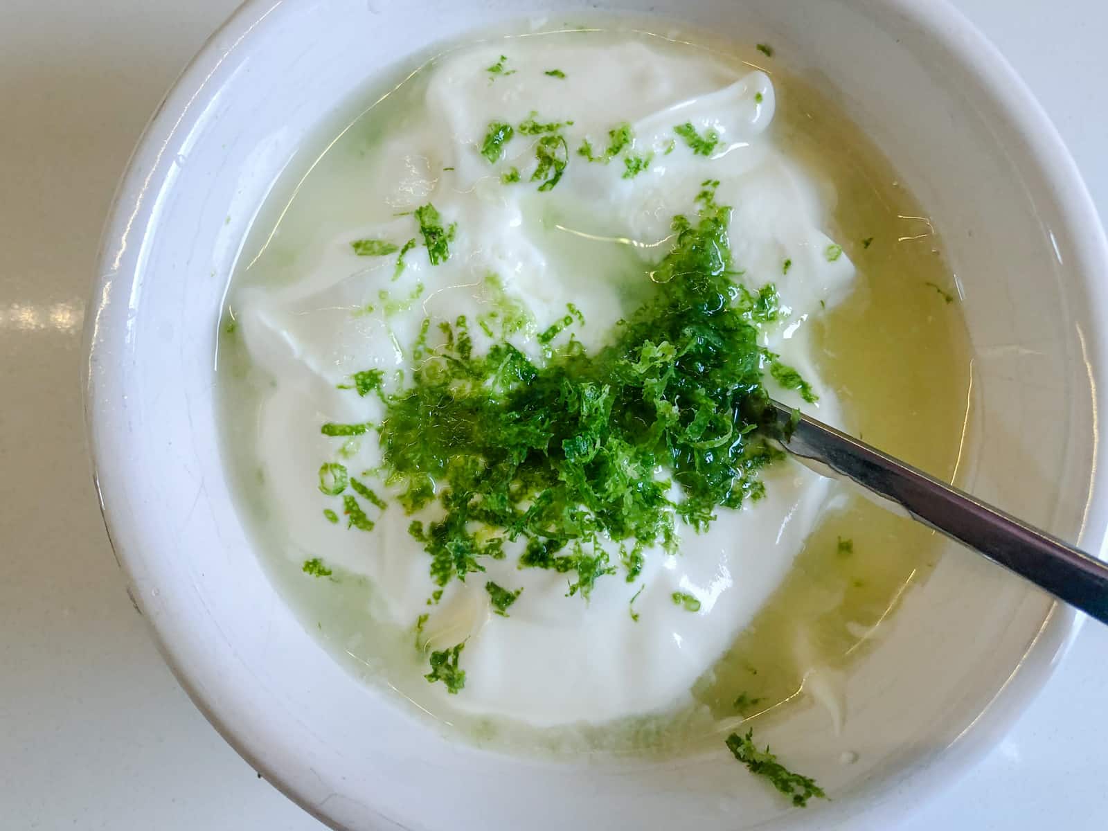 Lime zest and juice added to soured cream.