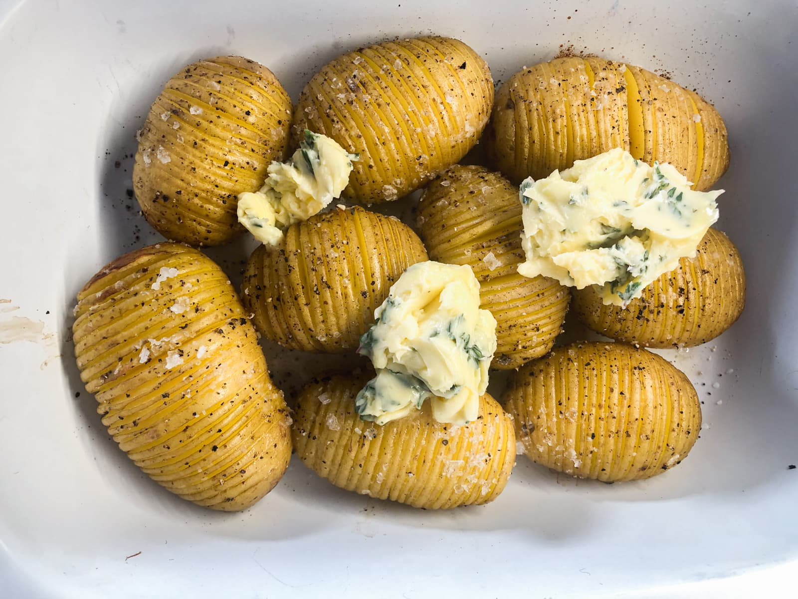 Added thyme butter to part baked hasselback potatoes.