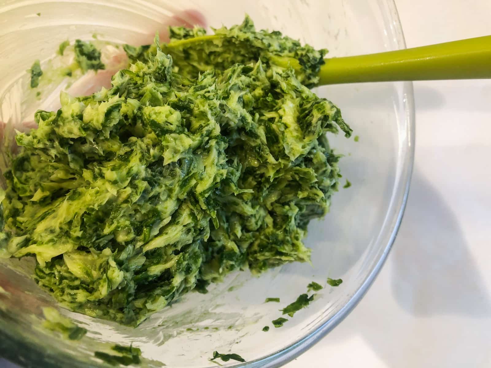 chopped wild garlic leaves mixed with butter to make wild garlic butter.