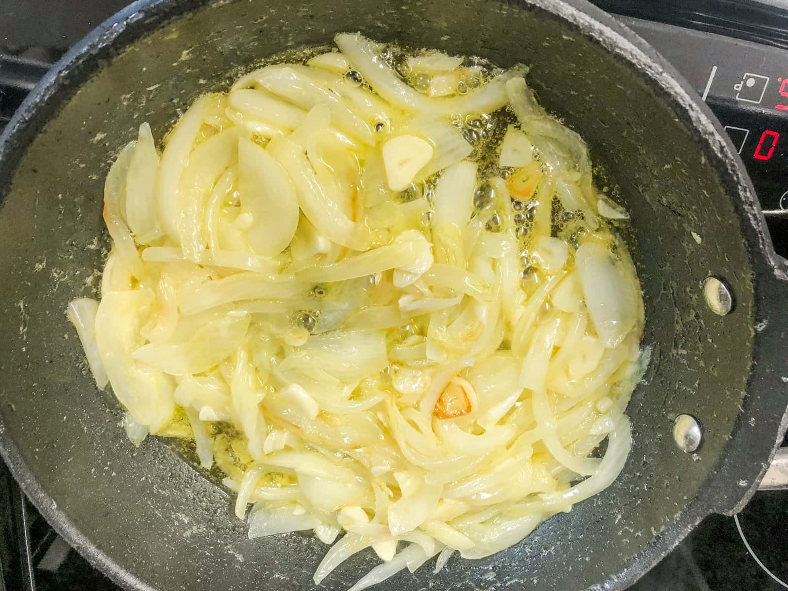 Sliced onions and garlic cooked down until golden in butter.