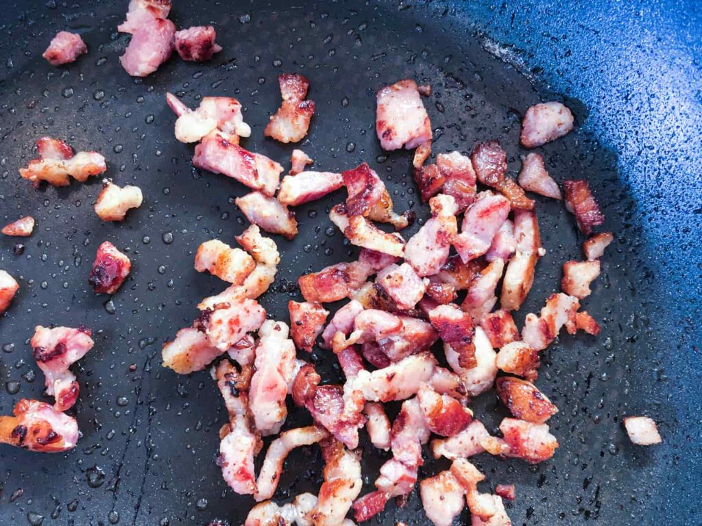 Diced smoked bacon pan fried until crispy.