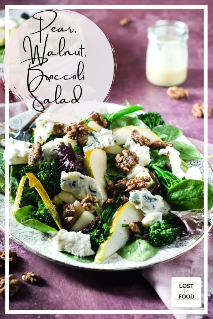 A pinterest graphic of a pear and walnut salad with blue cheese.