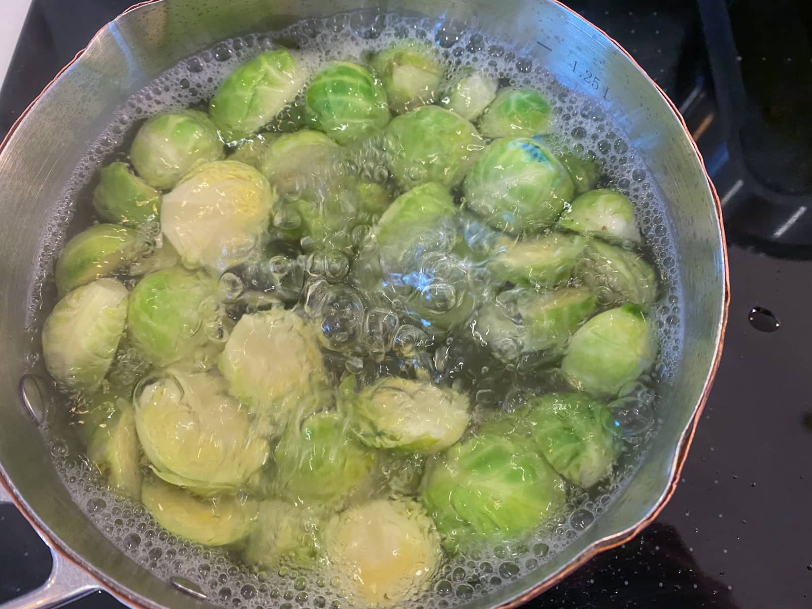 Brussel sprouts boiling in salted water.