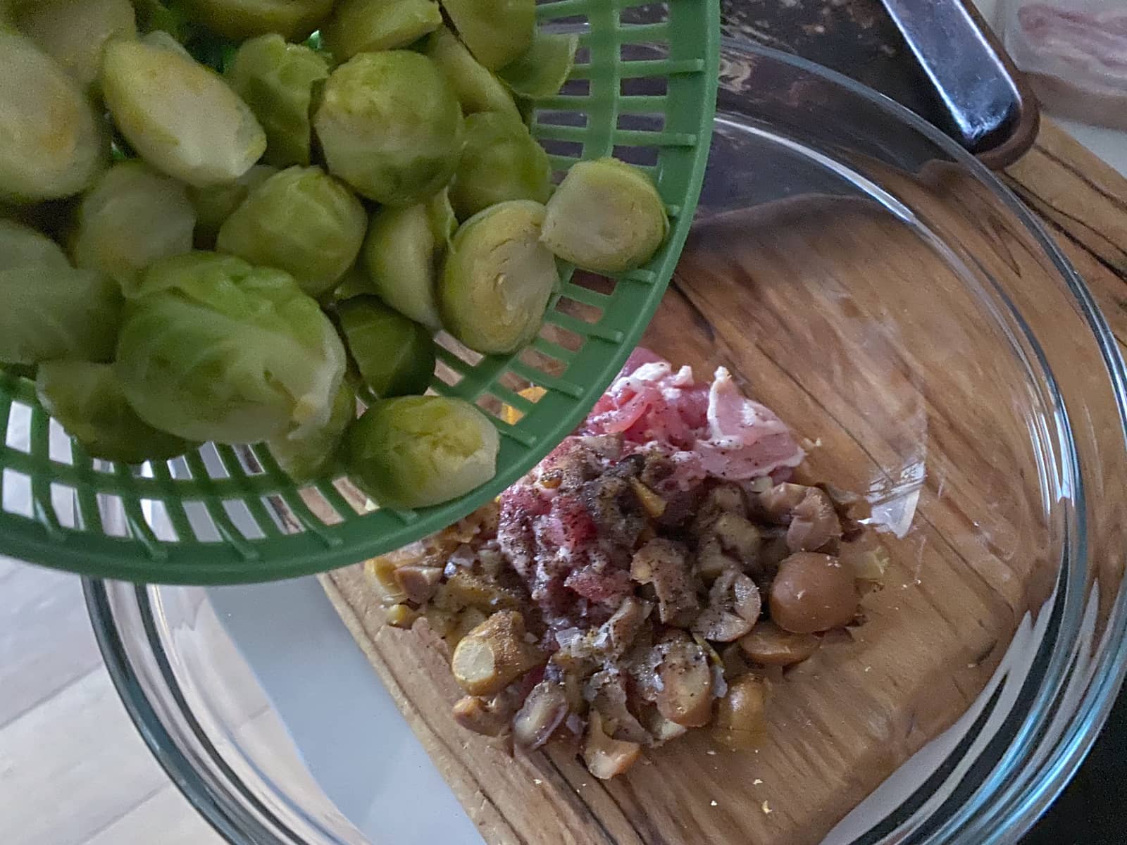 Par cooked sprouts added to seasoned bacon lardons and diced chestnuts.