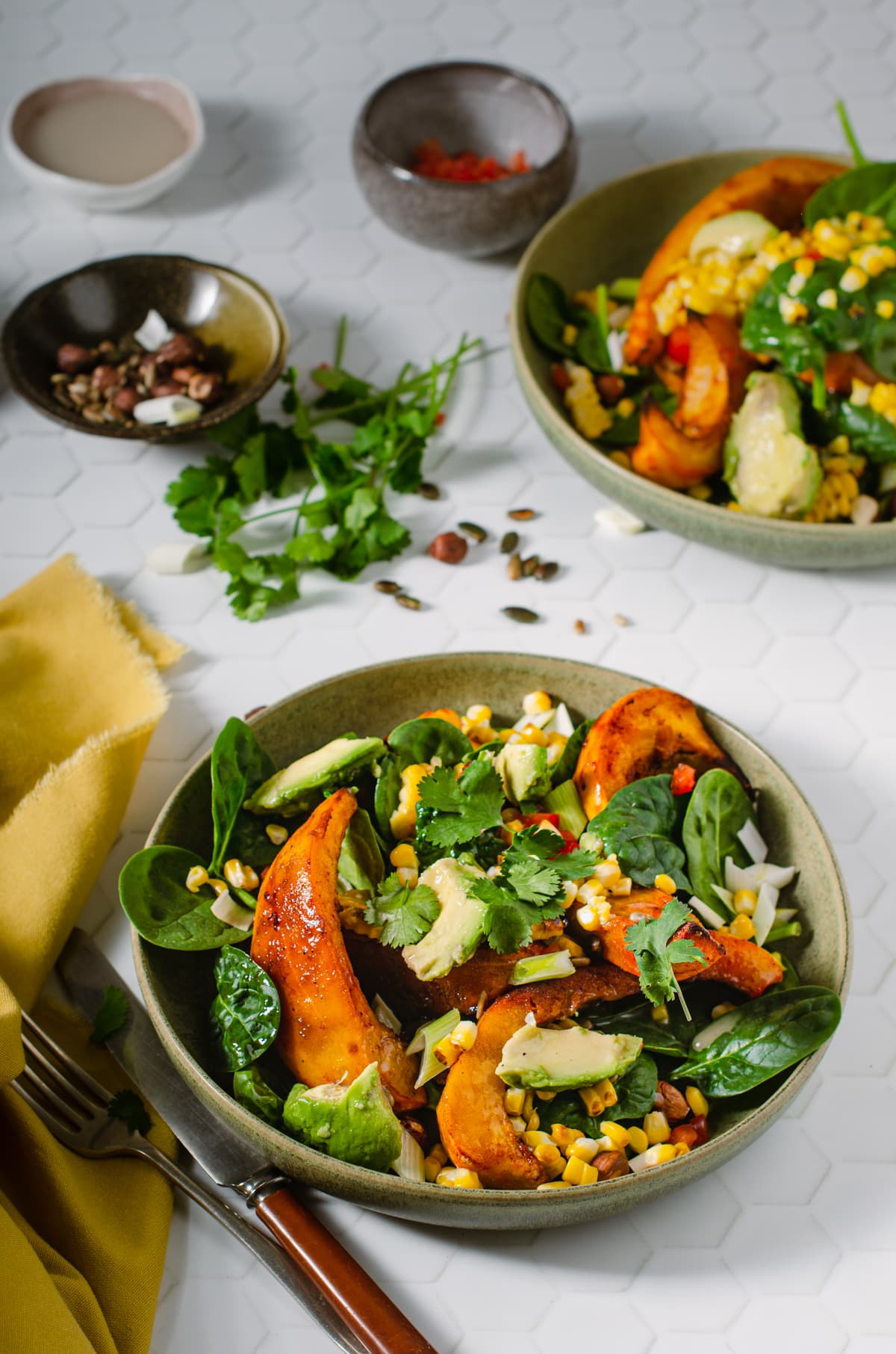 A delicious and fresh roasted pumpkin salad, with charred sweetcorn, avocado and spinach.