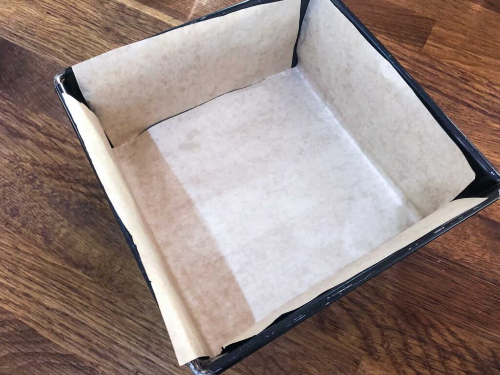 Parchment lined baking tray.