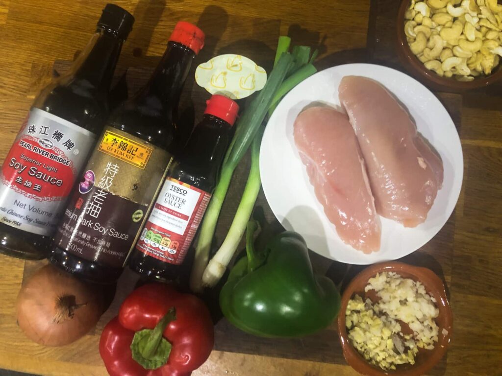 Ingredients to make a Chinese chicken and cashew stirfry.