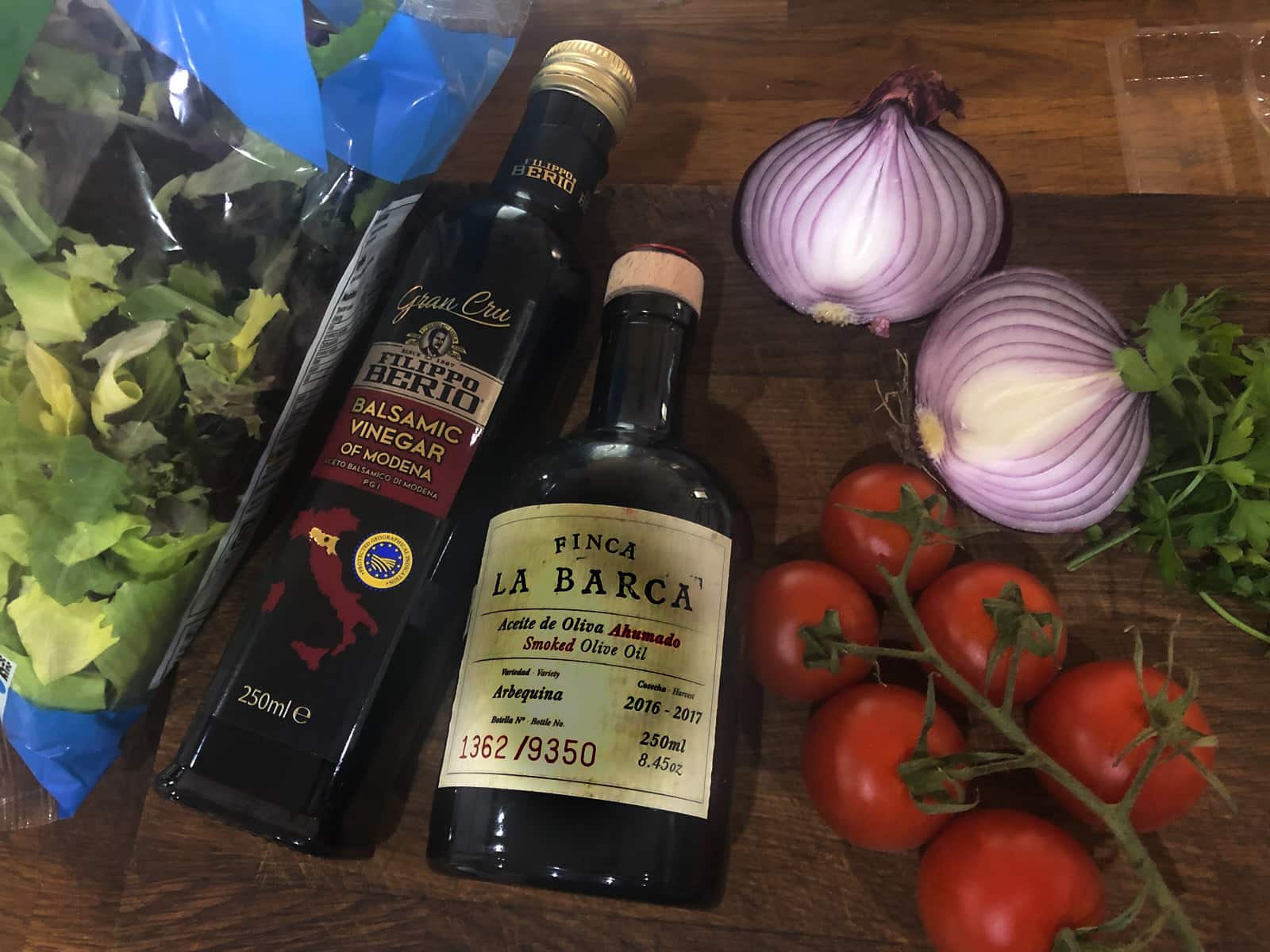 Ingredients to make a simple salad with balsamic dressing.