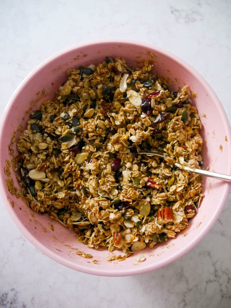 A bowl of mixed wet and dry flapjack ingredients.