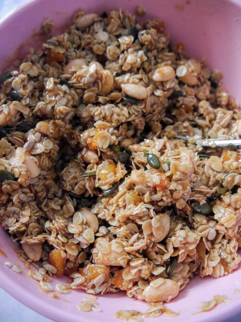A large mixing bowl filled with flapjack mixture.