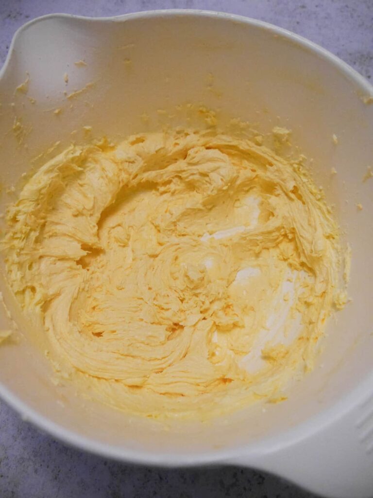 A bowl of creamed margarine and caster sugar.