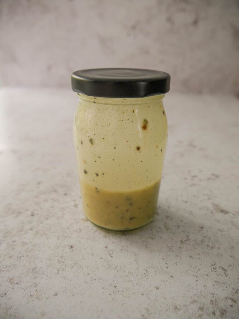 A small jar of French dressing.
