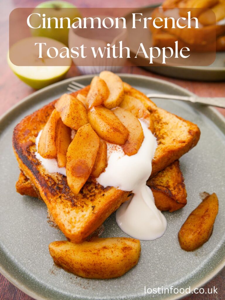 Pinnable image with recipe title and plate topped with cinnamon French toast with a serving of cinnamon apples and Greek yogurt on top.