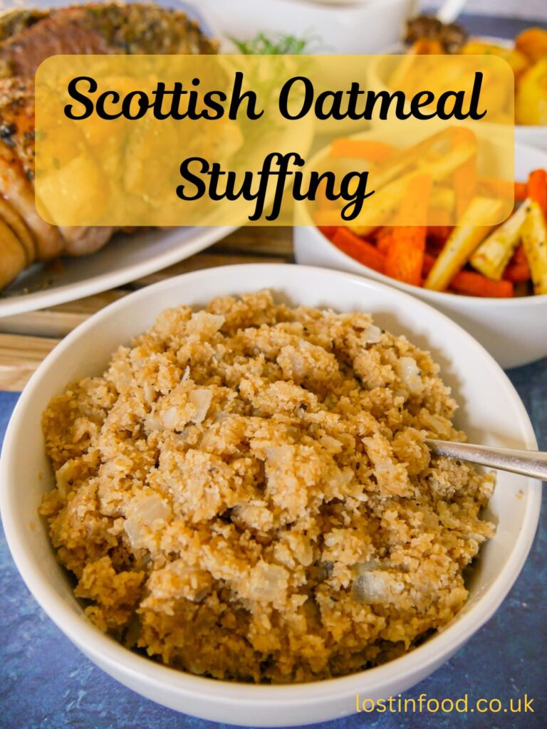 Pinnable image with recipe title and a bowl of Scottish oatmeal stuffing with roasted vegetables and turkey set alongside.