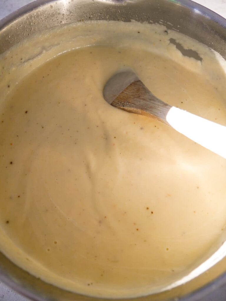 A saucepan of creamy parsnip soup.