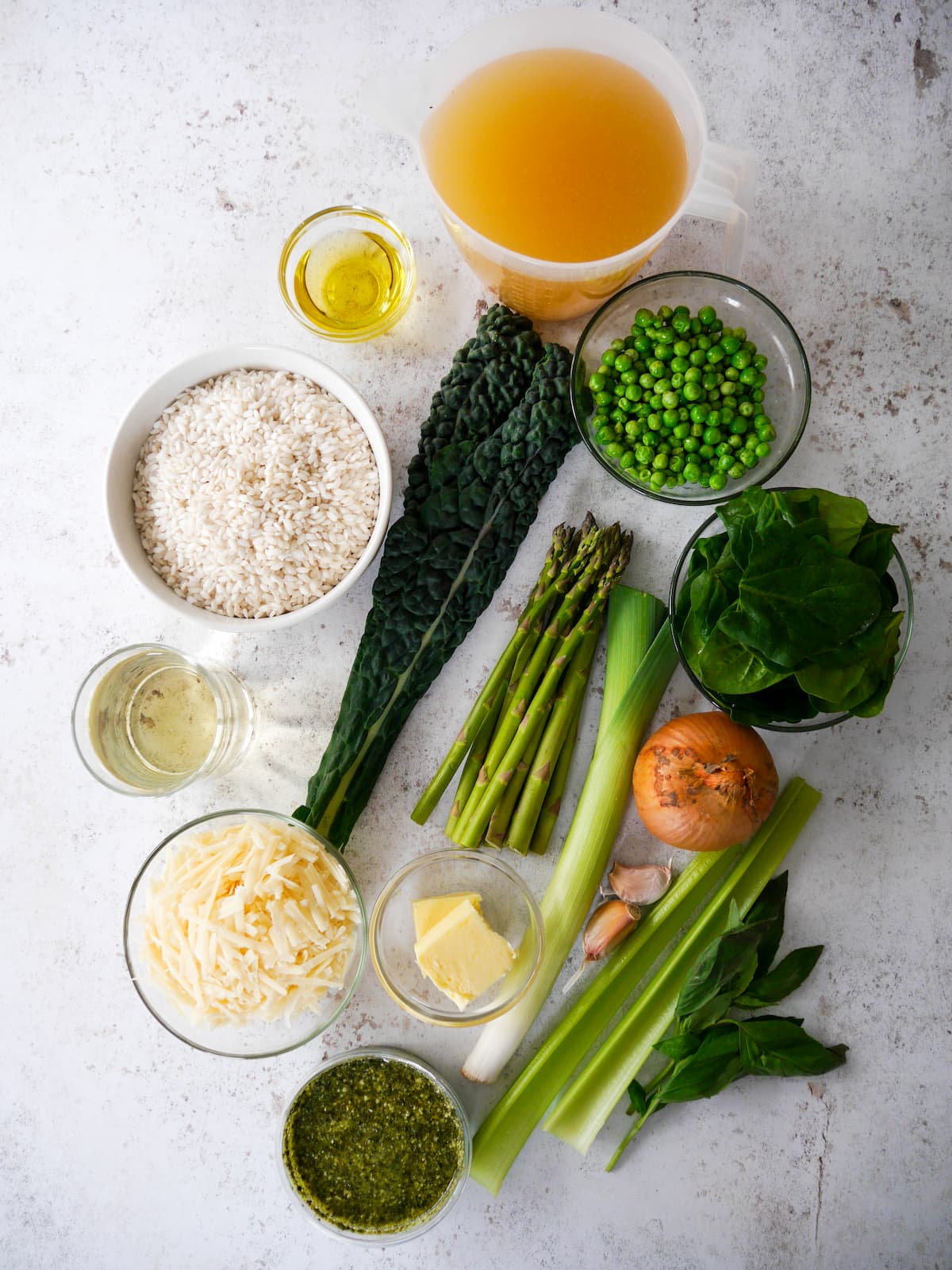 Individual recipe ingredients for spring vegetable risotto.
