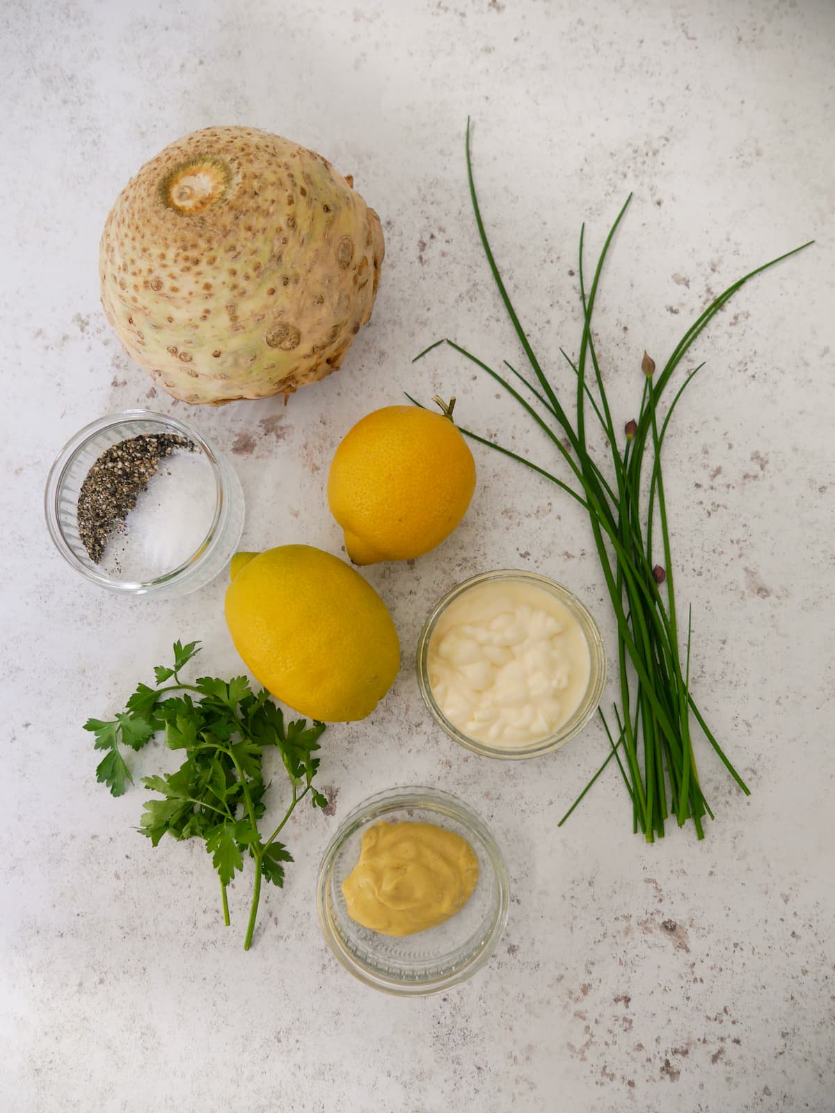 Individual recipe ingredients for making celeriac remoulade.
