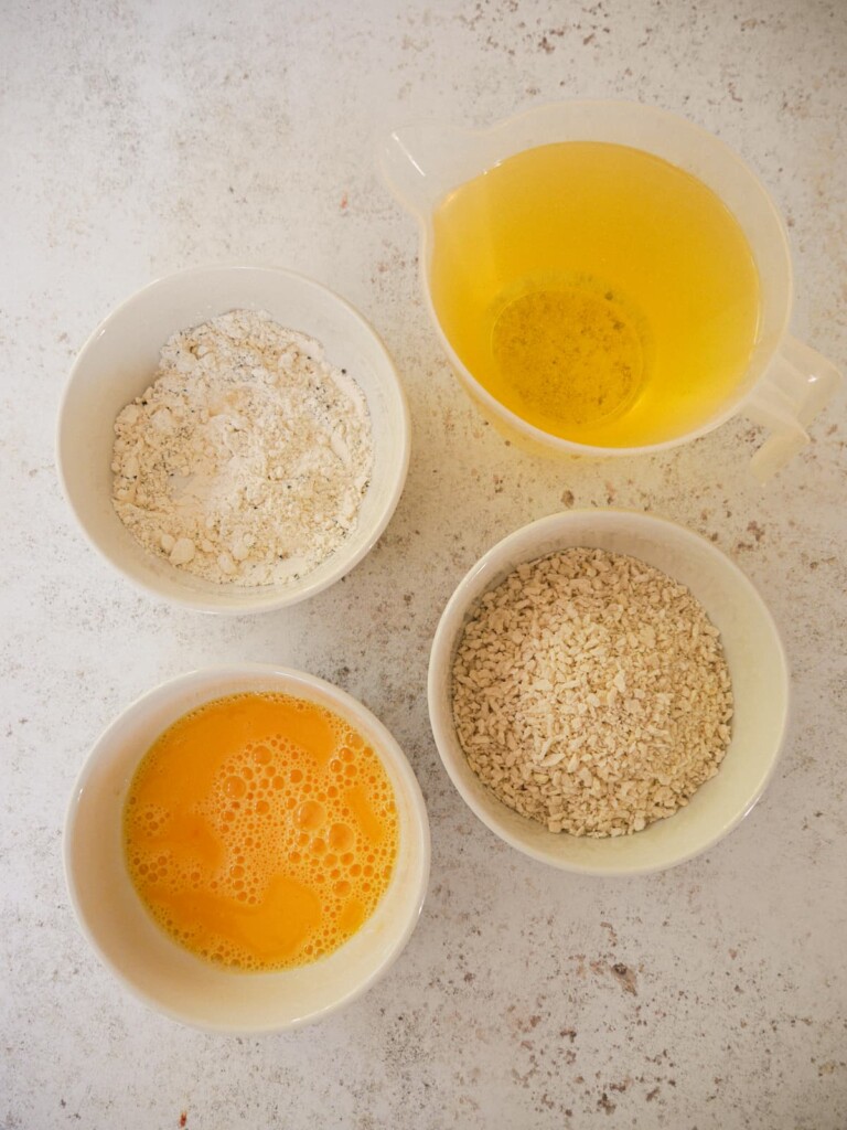Individual recipe ingredients for the croquettes breadcrumb coating.