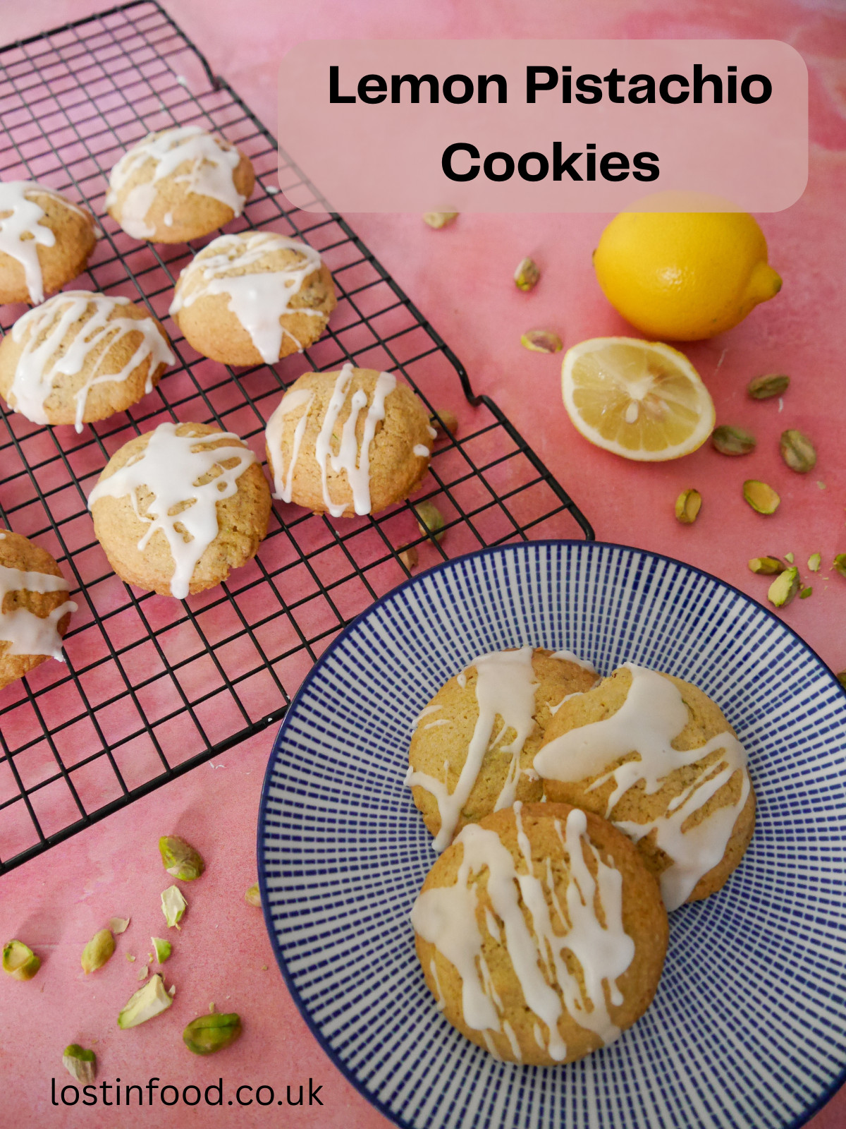Pinnable image with recipe title and a stack of lemon pistachio cookies with a wire rack of cookies set alongside.