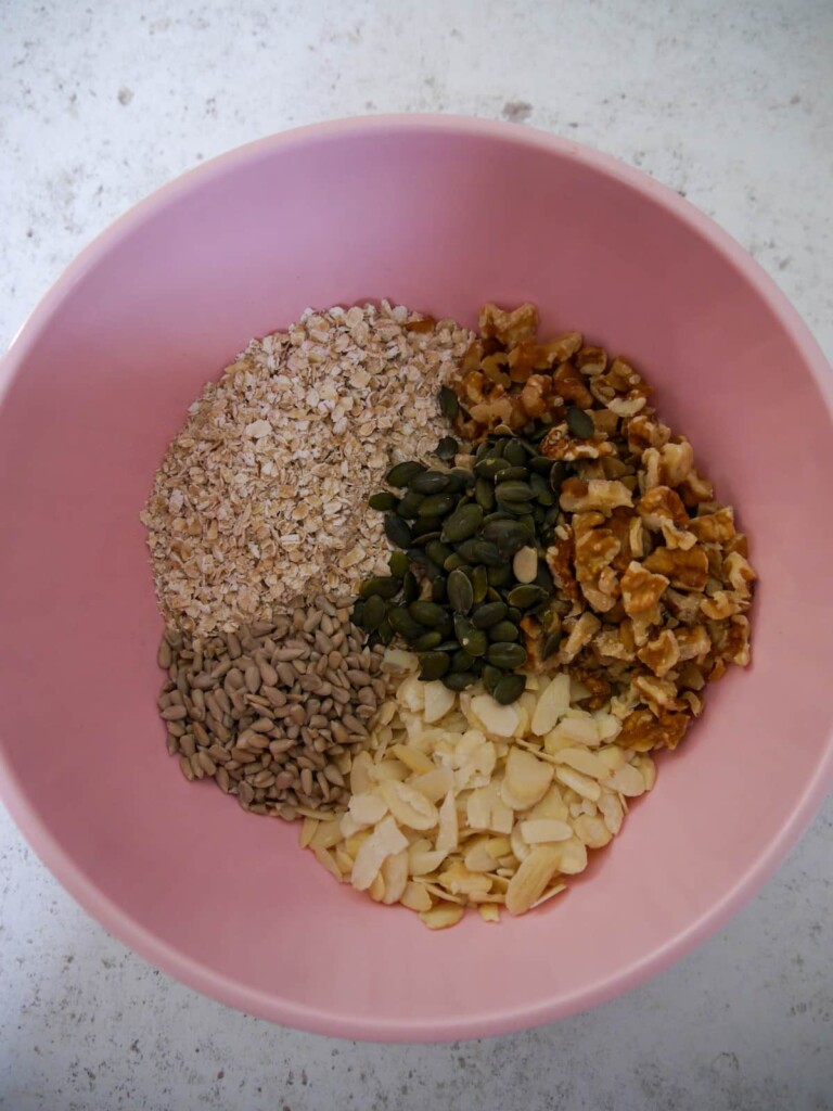 A bowl of dry granola ingredients.