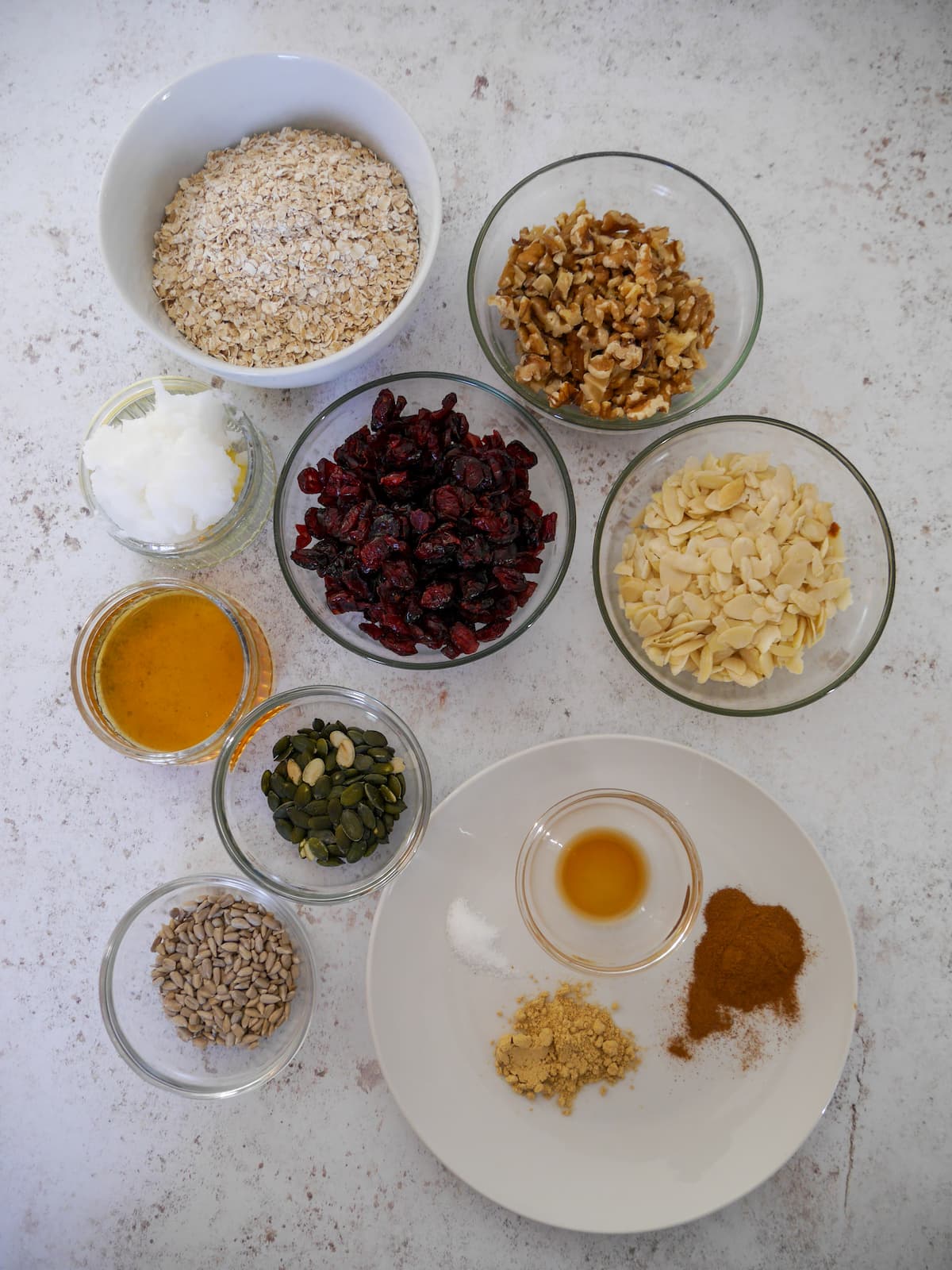 Recipe ingredients for spiced cranberry granola.
