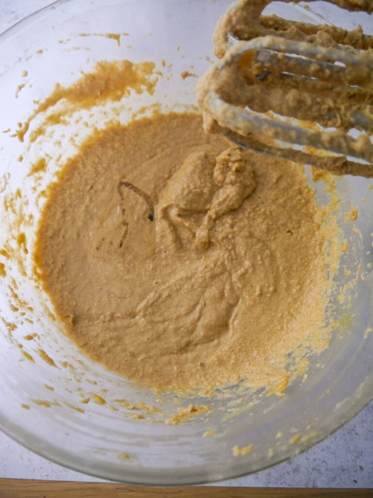 A bowl of whisked cake batter.