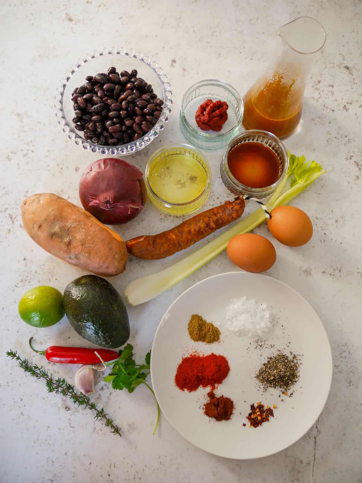 Individual recipe ingredients for making a Mexican breakfast or brunch bowl.